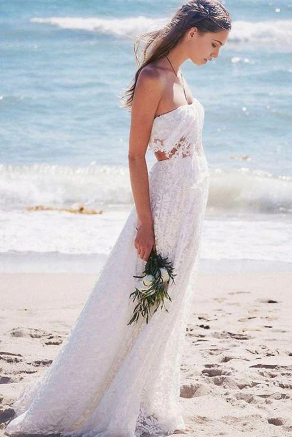 Hermosos vestidos de novia de playa estilo bohemio, sin tirantes, con encaje y hasta el suelo